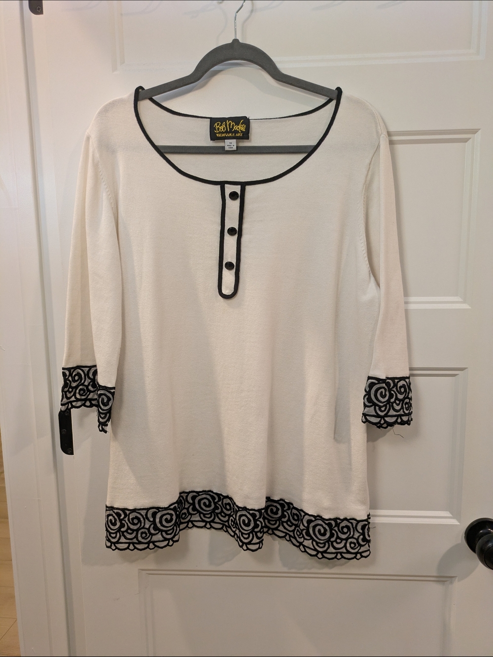 Bob Mackie Wearable Art: White Scoop Neck Sweater with Black Trim